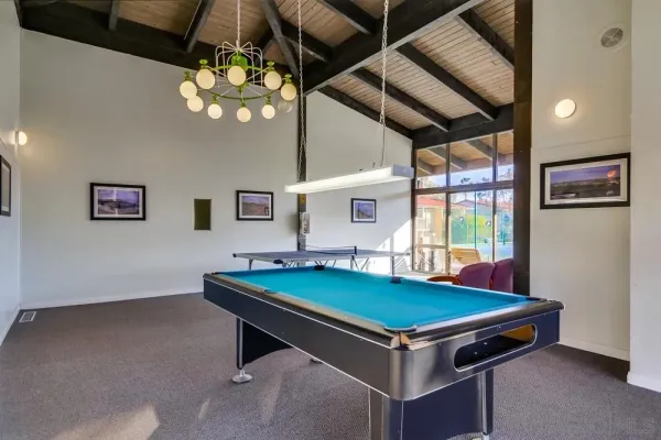 a view of swimming pool from a balcony