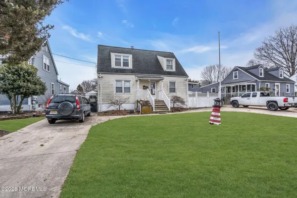 a view of a house with a back yard