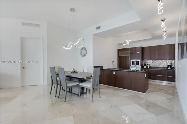 a view of a dining room with furniture