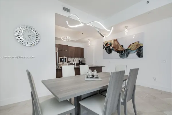 a view of a dining room with furniture