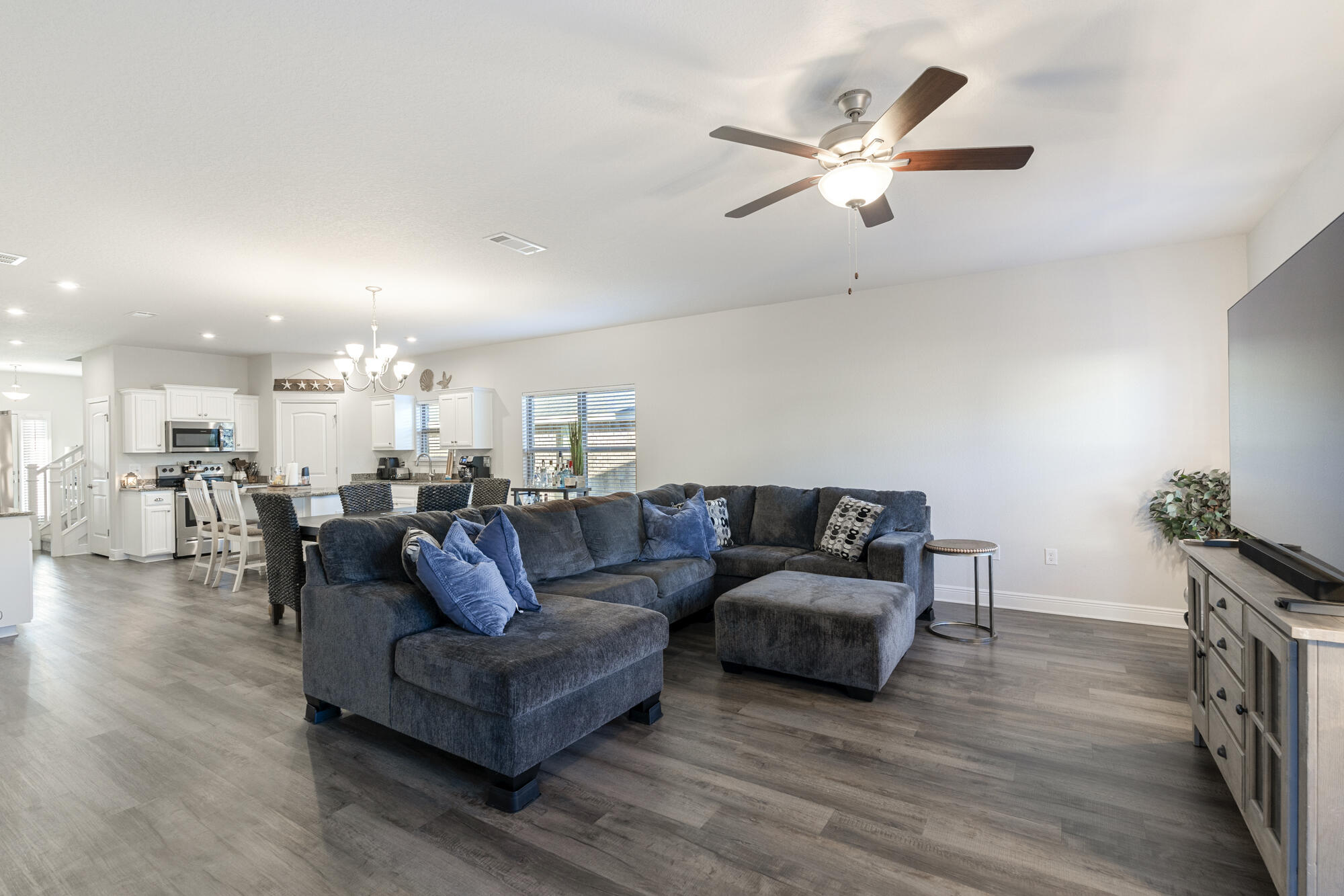 113 Ridgeway Circle Crestview, FL 32536 - Photo 15 of 54 a living room with furniture and a wooden floor