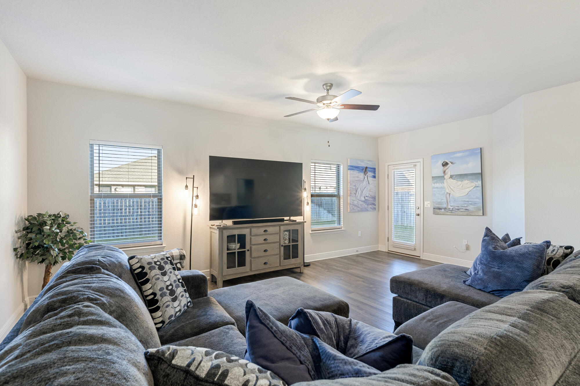 113 Ridgeway Circle Crestview, FL 32536 - Photo 17 of 54 a living room with furniture and a flat screen tv