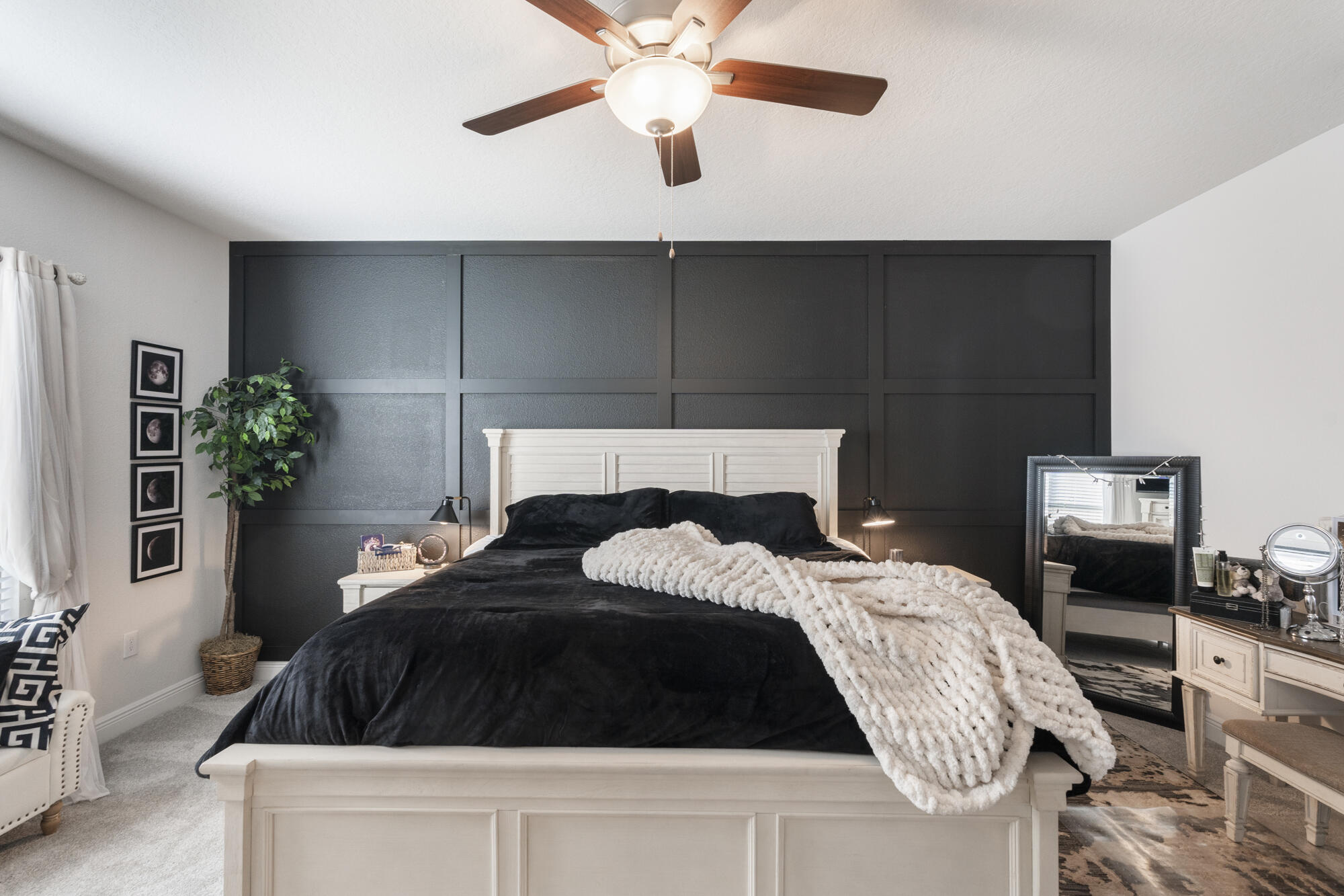 113 Ridgeway Circle Crestview, FL 32536 - Photo 19 of 54 a bedroom with a bed and a chandelier