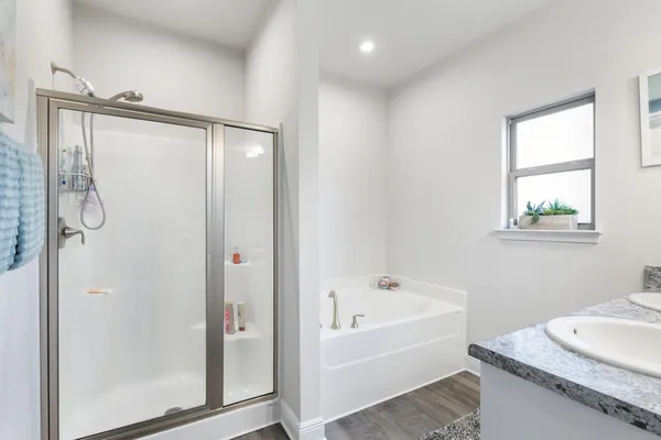 a view of a livingroom with workspace and a couch