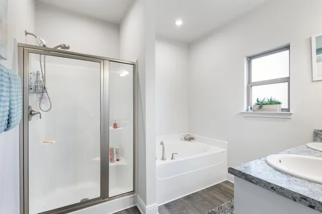 a view of a livingroom with workspace and a couch