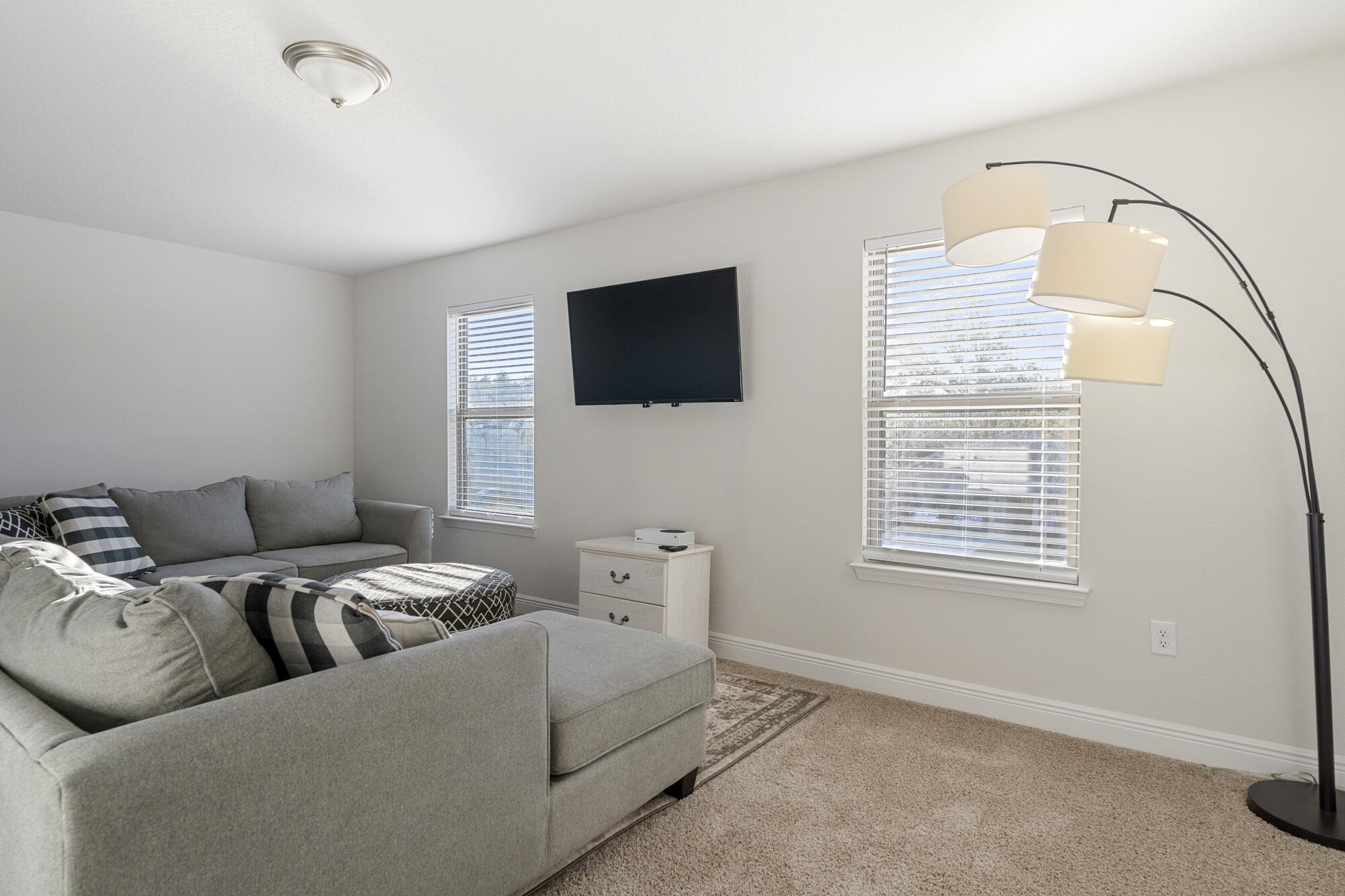 113 Ridgeway Circle Crestview, FL 32536 - Photo 31 of 54 a living room with furniture and a flat screen tv