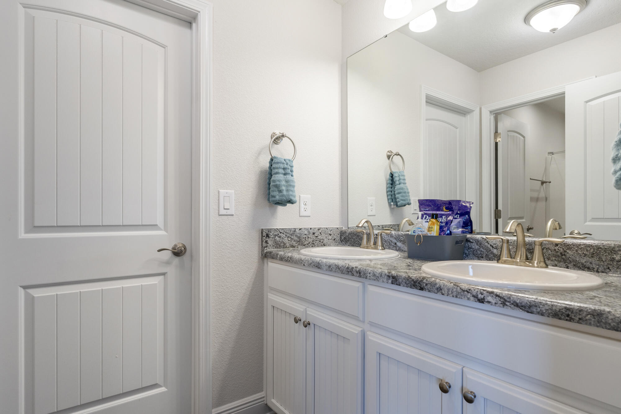 113 Ridgeway Circle Crestview, FL 32536 - Photo 43 of 54 a bathroom with a granite countertop sink and a mirror