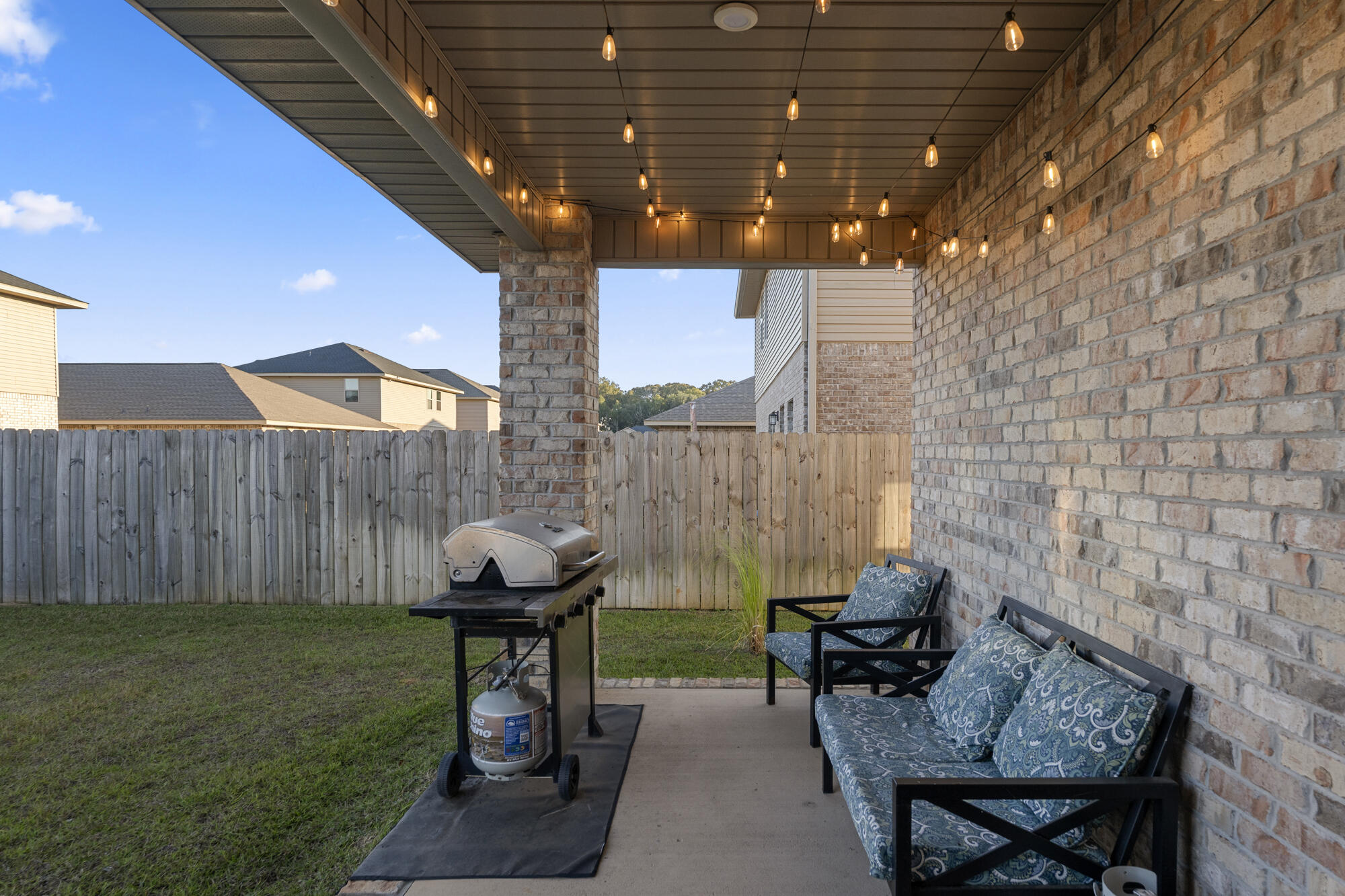 113 Ridgeway Circle Crestview, FL 32536 - Photo 48 of 54 a view of a porch with furniture and a yard