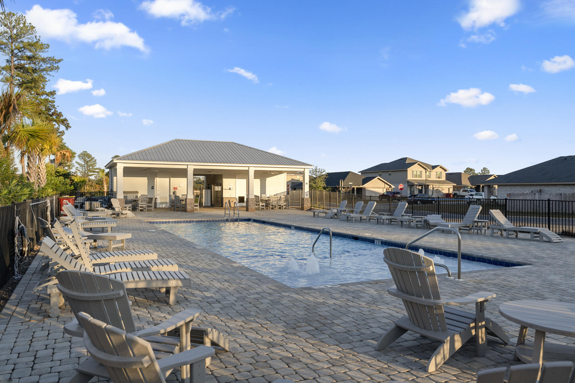 113 Ridgeway Circle Crestview, FL 32536 - Photo 52 of 54 a swimming pool with outdoor seating and yard