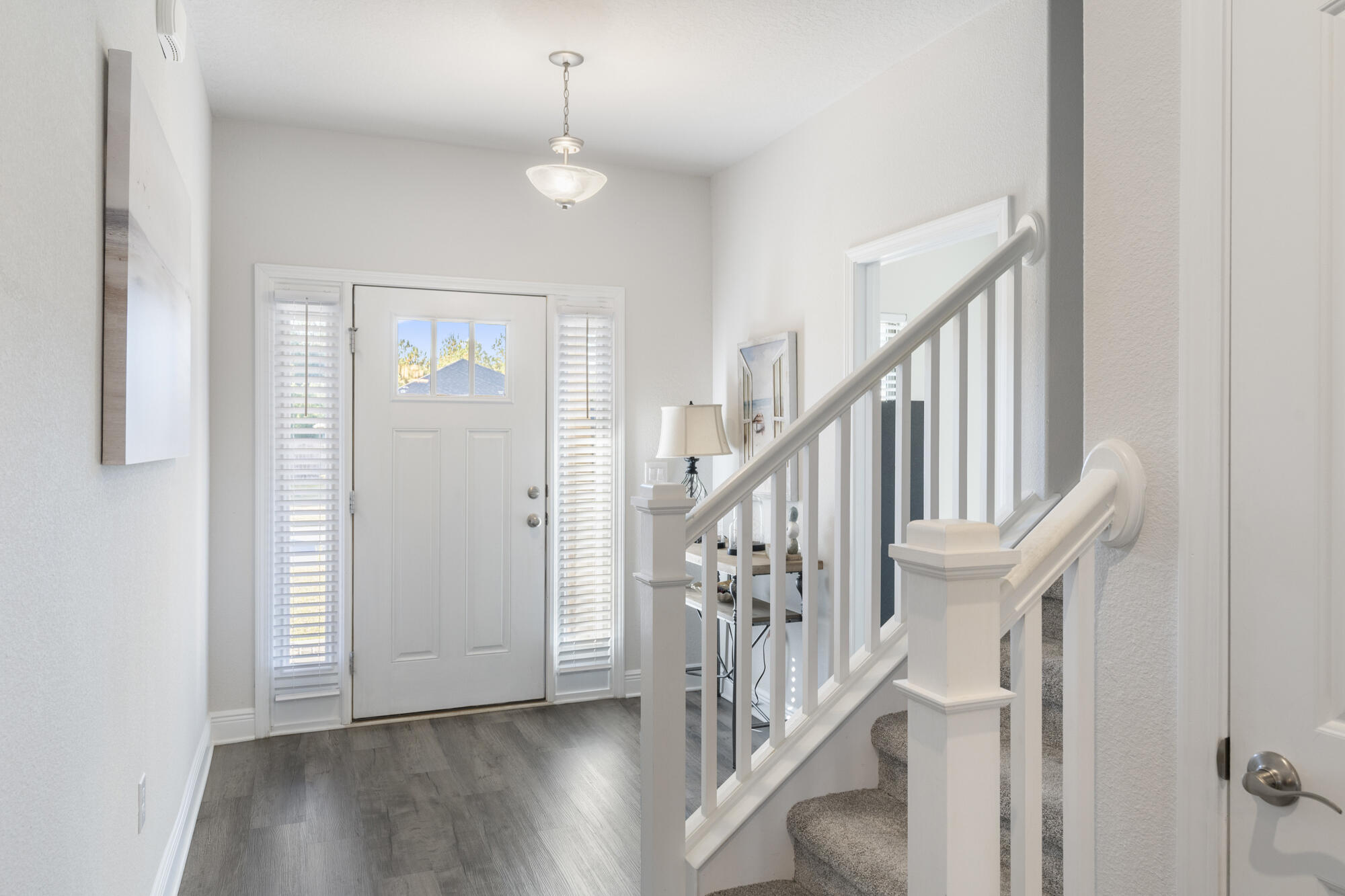 113 Ridgeway Circle Crestview, FL 32536 - Photo 7 of 54 a view of staircase with wooden floor and staircase