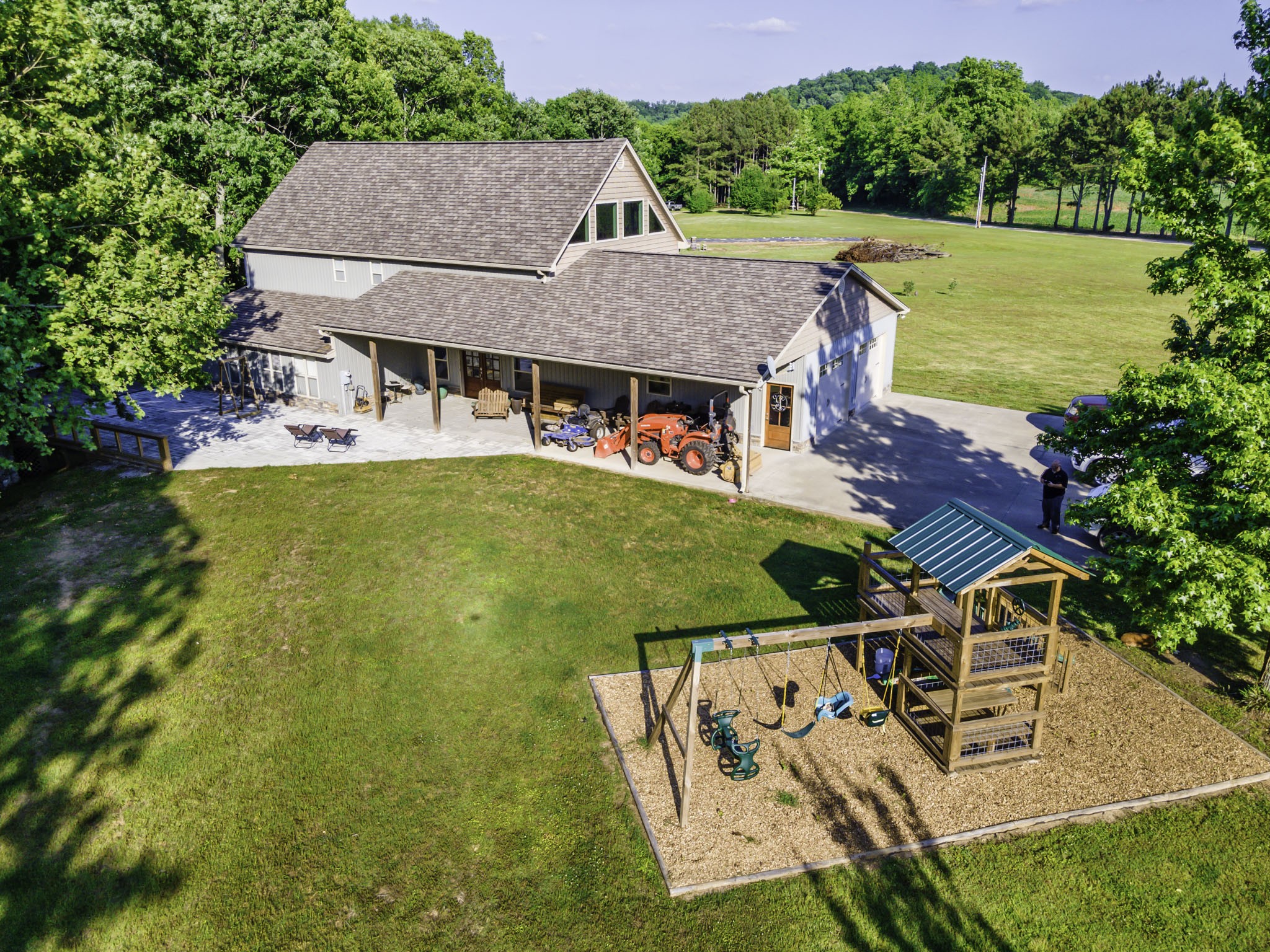 82 Railroad Road Westpoint, TN 38486 - Photo 2 of 30 an aerial view of a house with swimming pool garden and patio