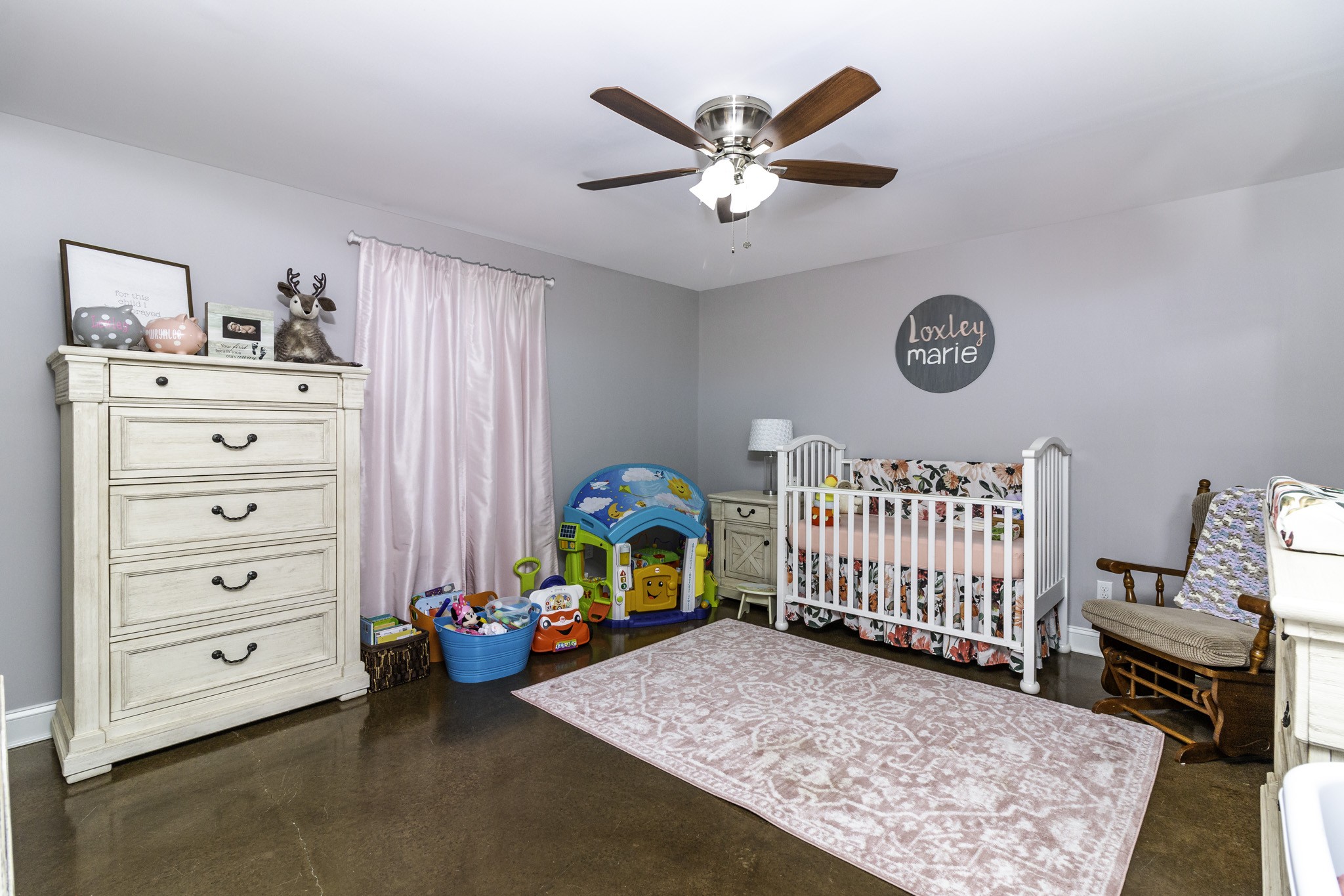82 Railroad Road Westpoint, TN 38486 - Photo 12 of 30 a bedroom with a bed and a chandelier