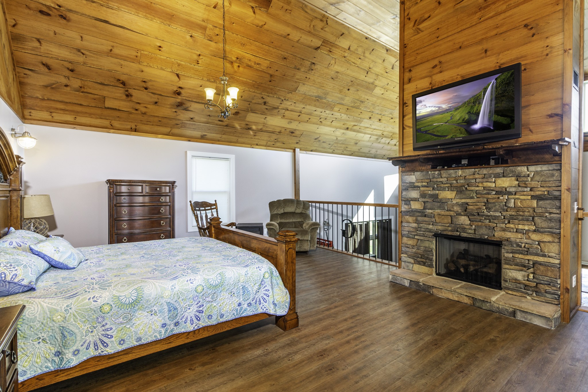 82 Railroad Road Westpoint, TN 38486 - Photo 14 of 30 a bedroom with a bed and a flat screen tv