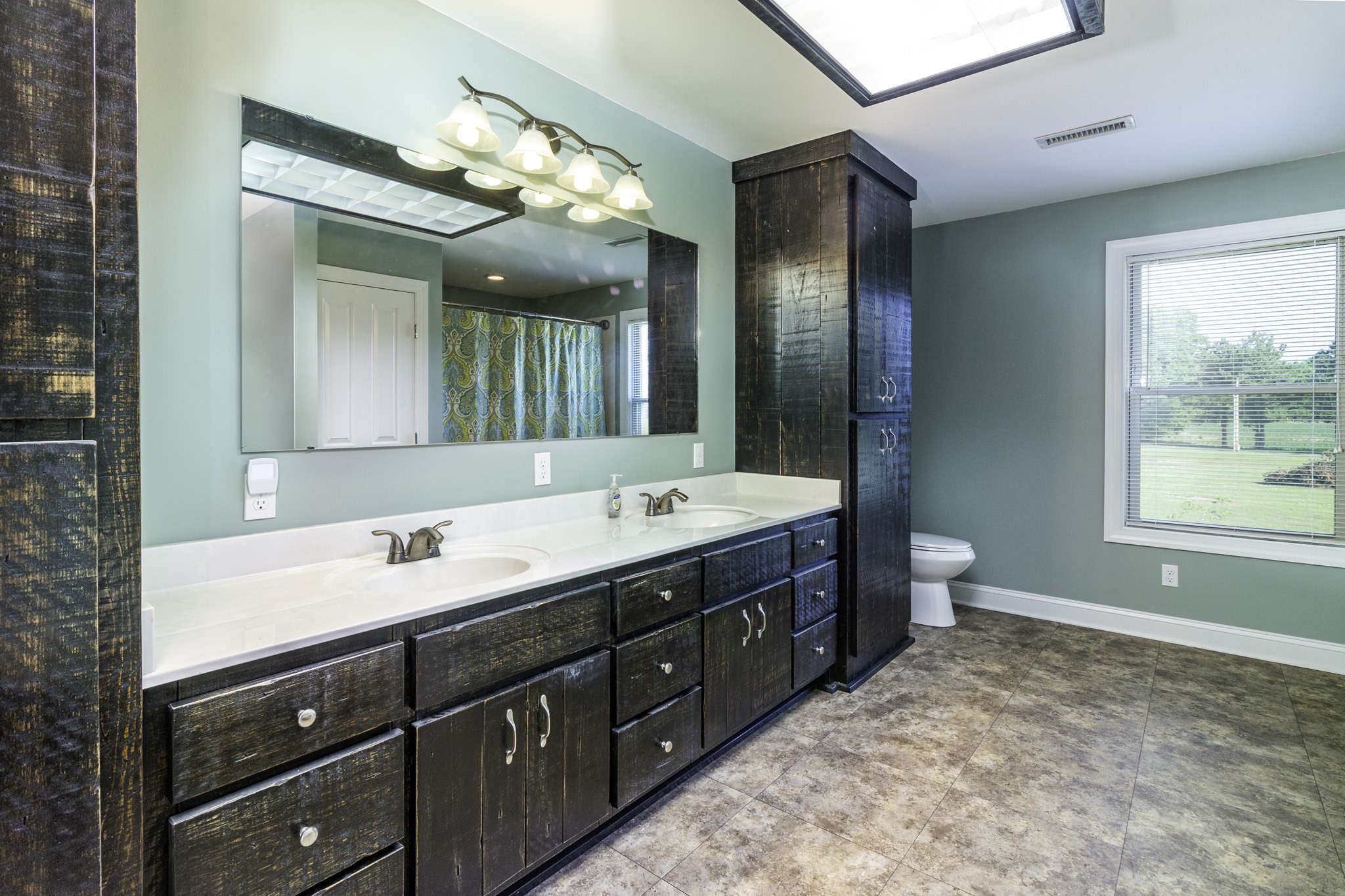 82 Railroad Road Westpoint, TN 38486 - Photo 16 of 30 a spacious bathroom with a double vanity sink mirror and double