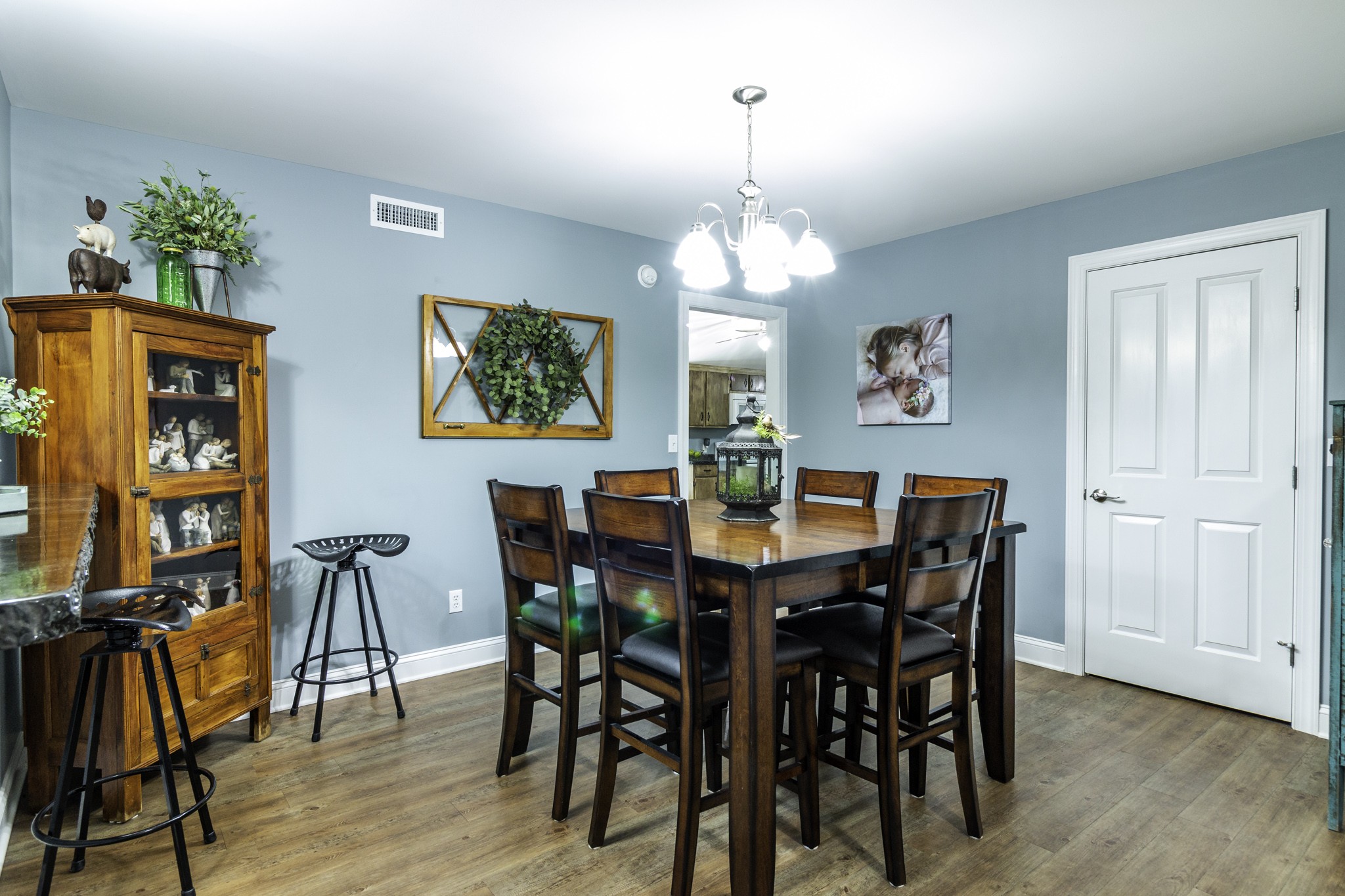 82 Railroad Road Westpoint, TN 38486 - Photo 6 of 30 a view of a dining room with furniture wooden floor and chandelier