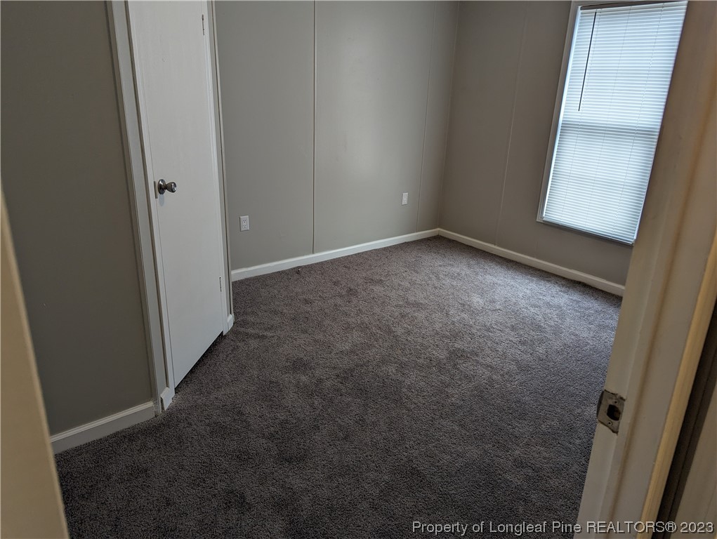 271 Eisler Drive Lillington, NC 27546 - Photo 13 of 17 an empty room with windows