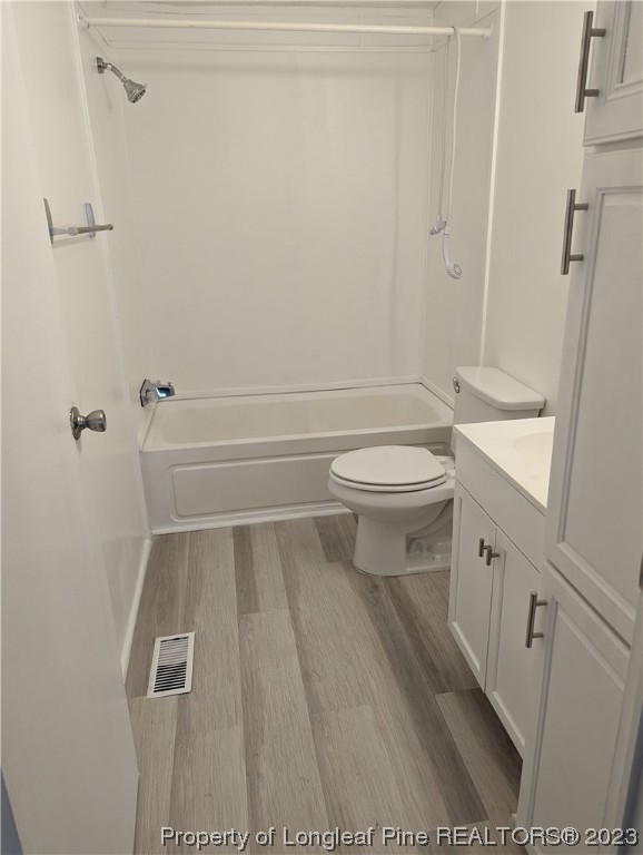 271 Eisler Drive Lillington, NC 27546 - Photo 14 of 17 a bathroom with a toilet a sink and shower