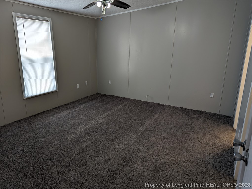 271 Eisler Drive Lillington, NC 27546 - Photo 7 of 17 an empty room with a window