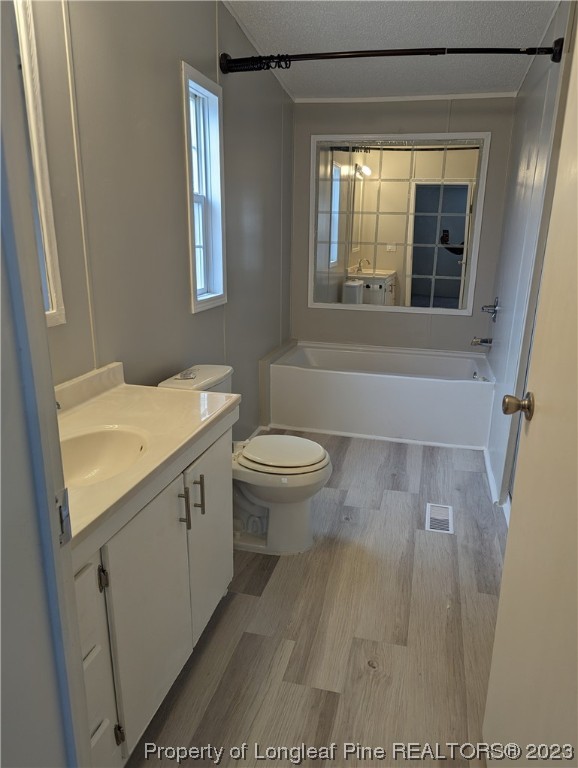 271 Eisler Drive Lillington, NC 27546 - Photo 9 of 17 a bathroom with a sink toilet and next to a window