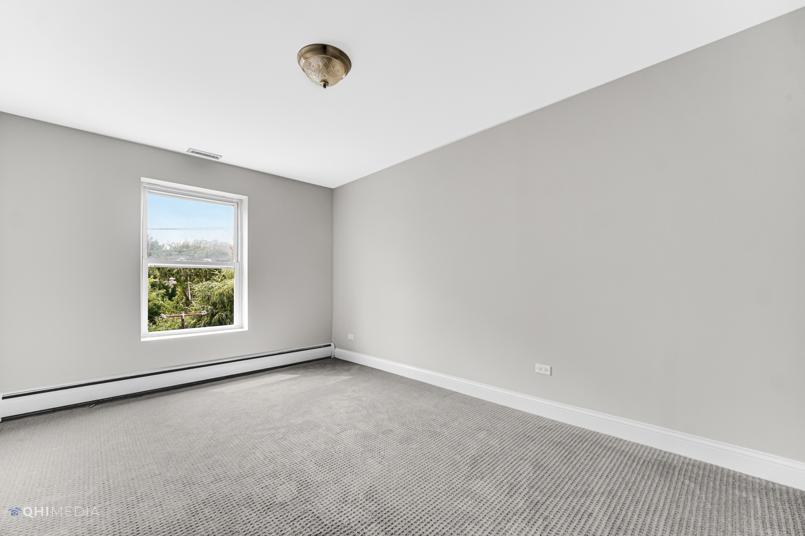 1750 North Wells Street, Unit 403 Chicago, IL 60614 - Photo 11 of 20 an empty room with windows
