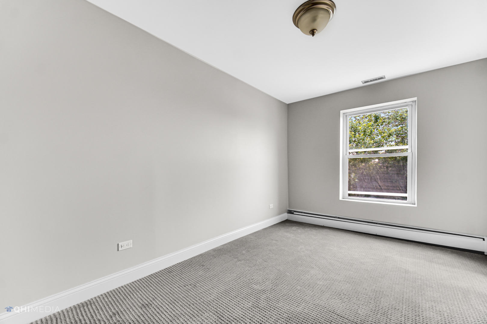 1750 North Wells Street, Unit 403 Chicago, IL 60614 - Photo 12 of 20 an empty room with a window