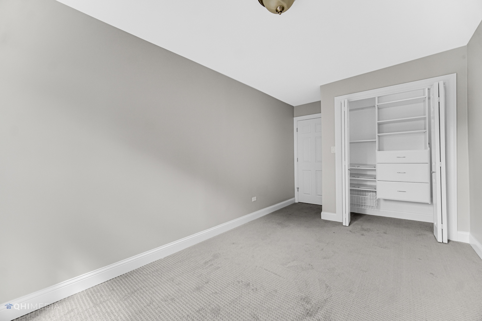 1750 North Wells Street, Unit 403 Chicago, IL 60614 - Photo 13 of 20 a view of an empty room and closet