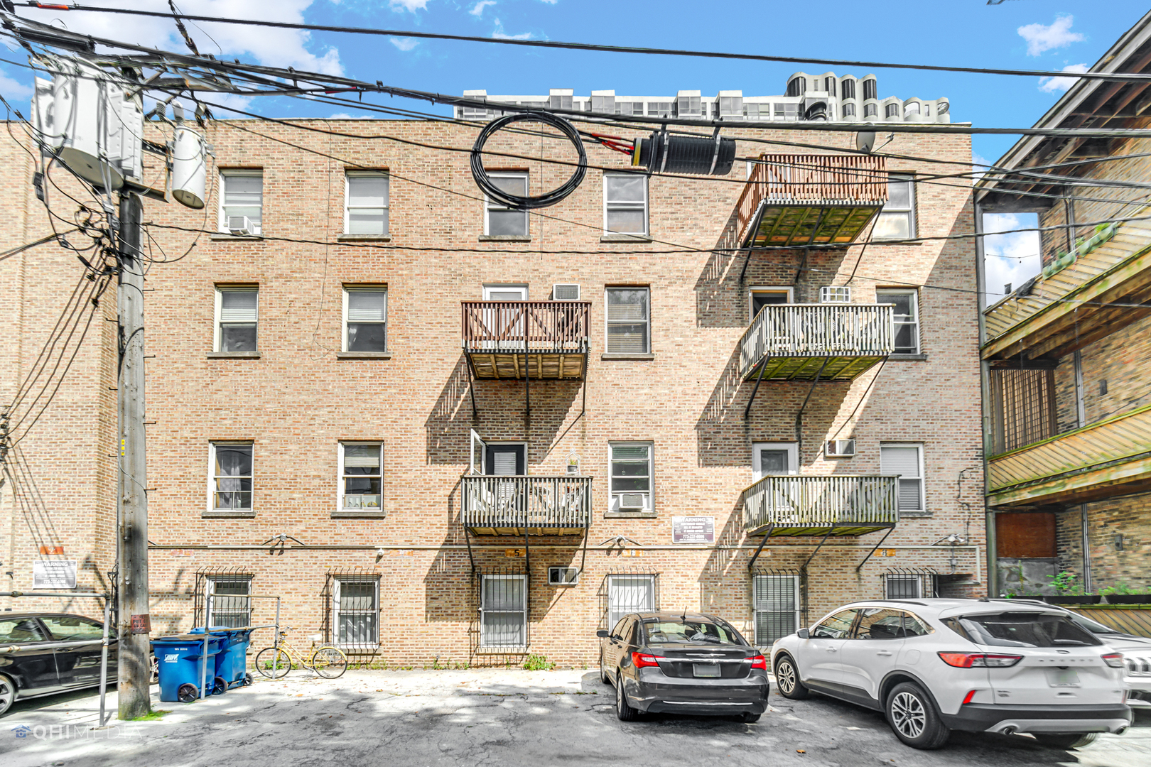 1750 North Wells Street, Unit 403 Chicago, IL 60614 - Photo 18 of 20 a view of a city street with cars