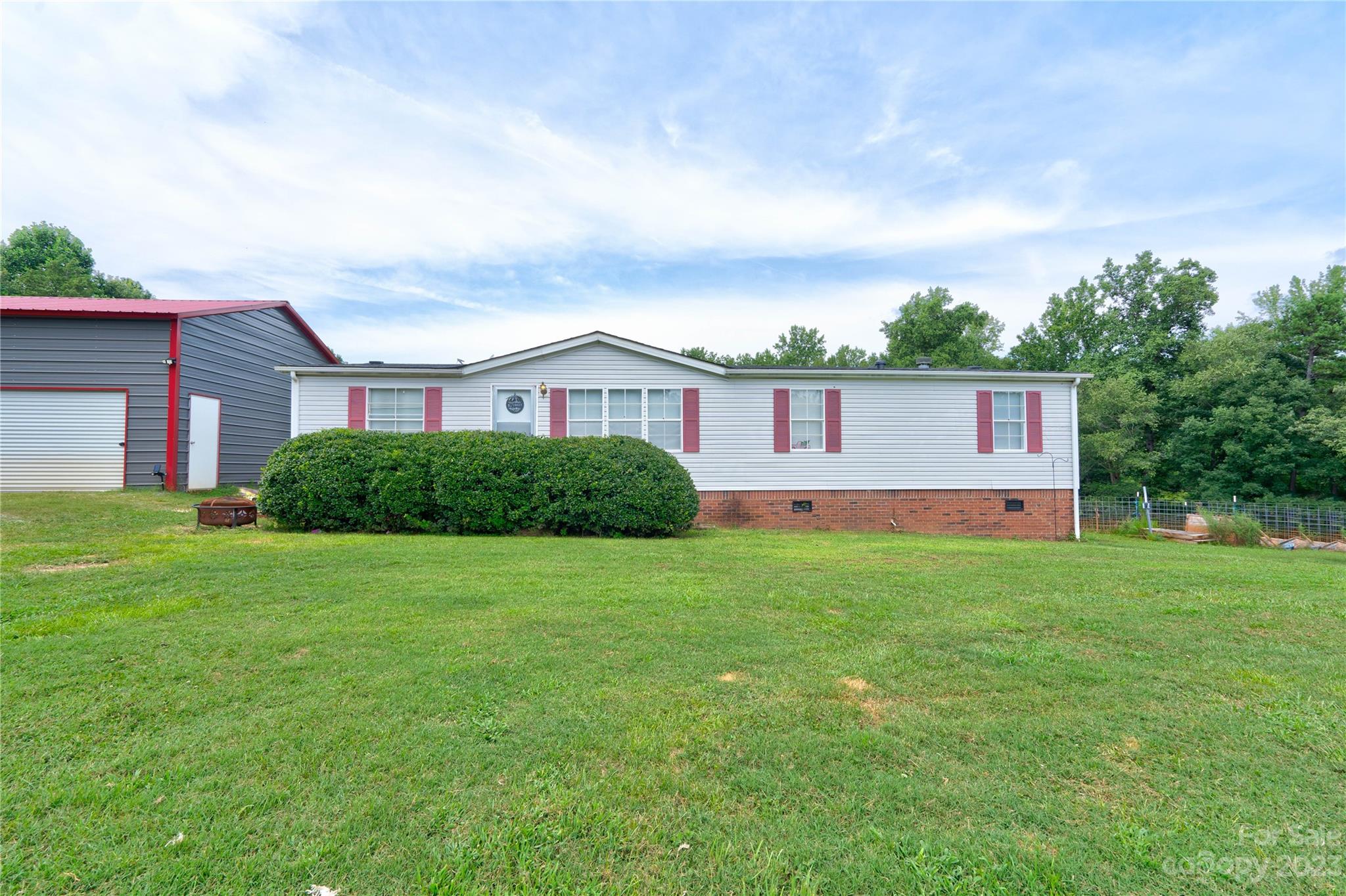 a view of a yard in front of a house