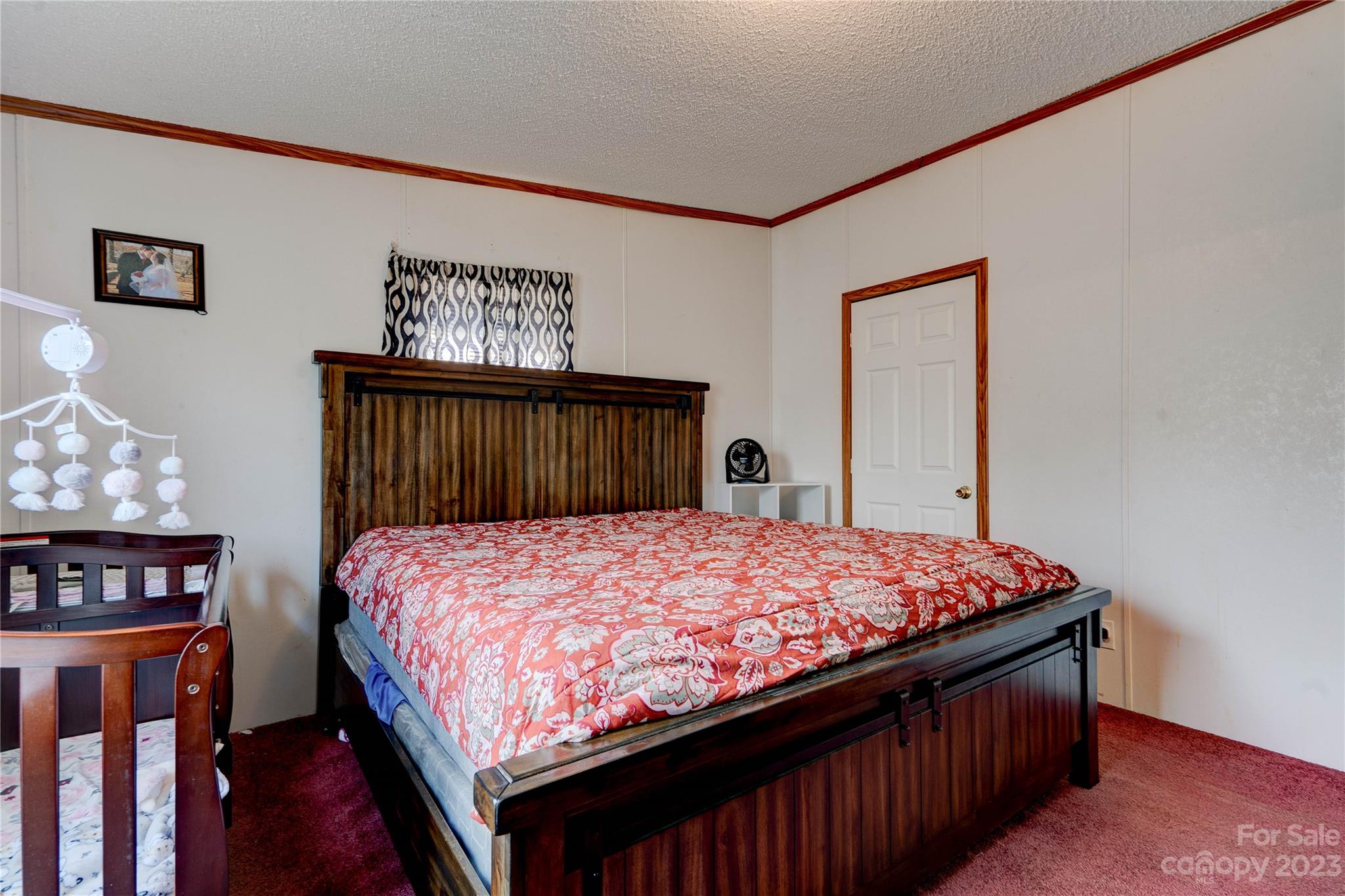 389 Shires Road Ellenboro, NC 28040 - Photo 12 of 30 a bed sitting in a bedroom and dresser