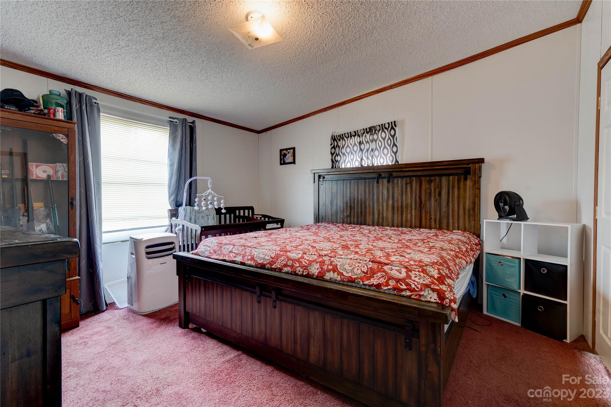 389 Shires Road Ellenboro, NC 28040 - Photo 14 of 30 a bedroom with a bed and a window