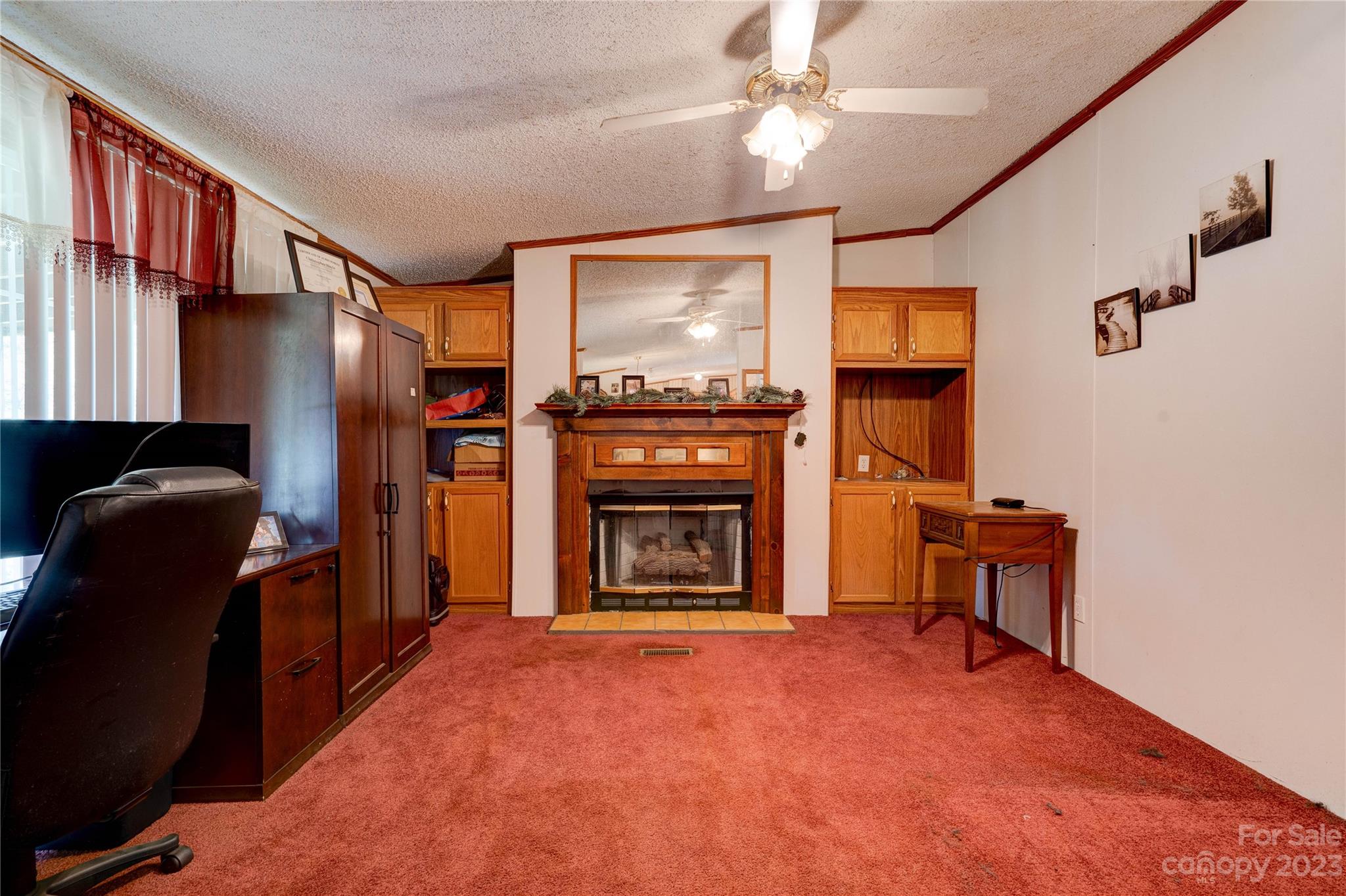 389 Shires Road Ellenboro, NC 28040 - Photo 18 of 30 a view of a livingroom with a fireplace