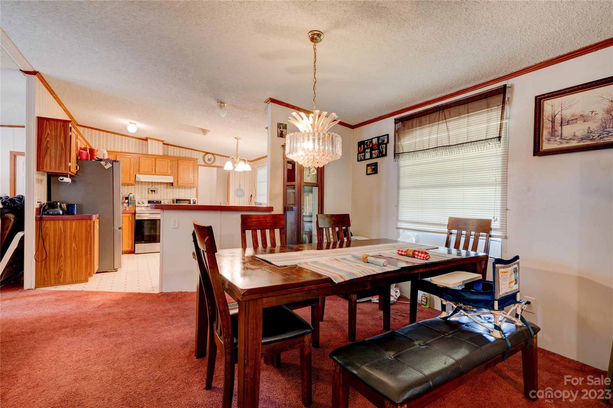 389 Shires Road Ellenboro, NC 28040 - Photo 21 of 30 a view of a dining room with furniture