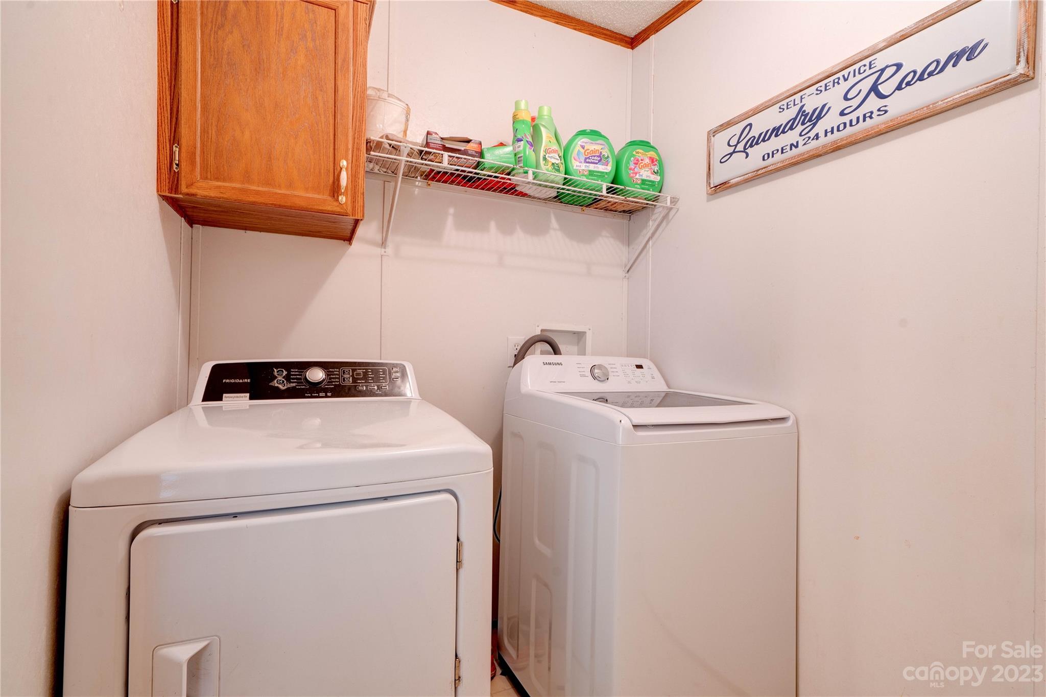 389 Shires Road Ellenboro, NC 28040 - Photo 25 of 30 a utility room with dryer and washer