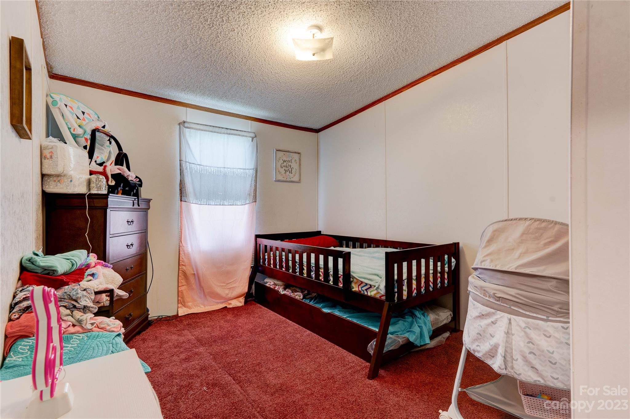 389 Shires Road Ellenboro, NC 28040 - Photo 28 of 30 a bedroom with furniture and a window
