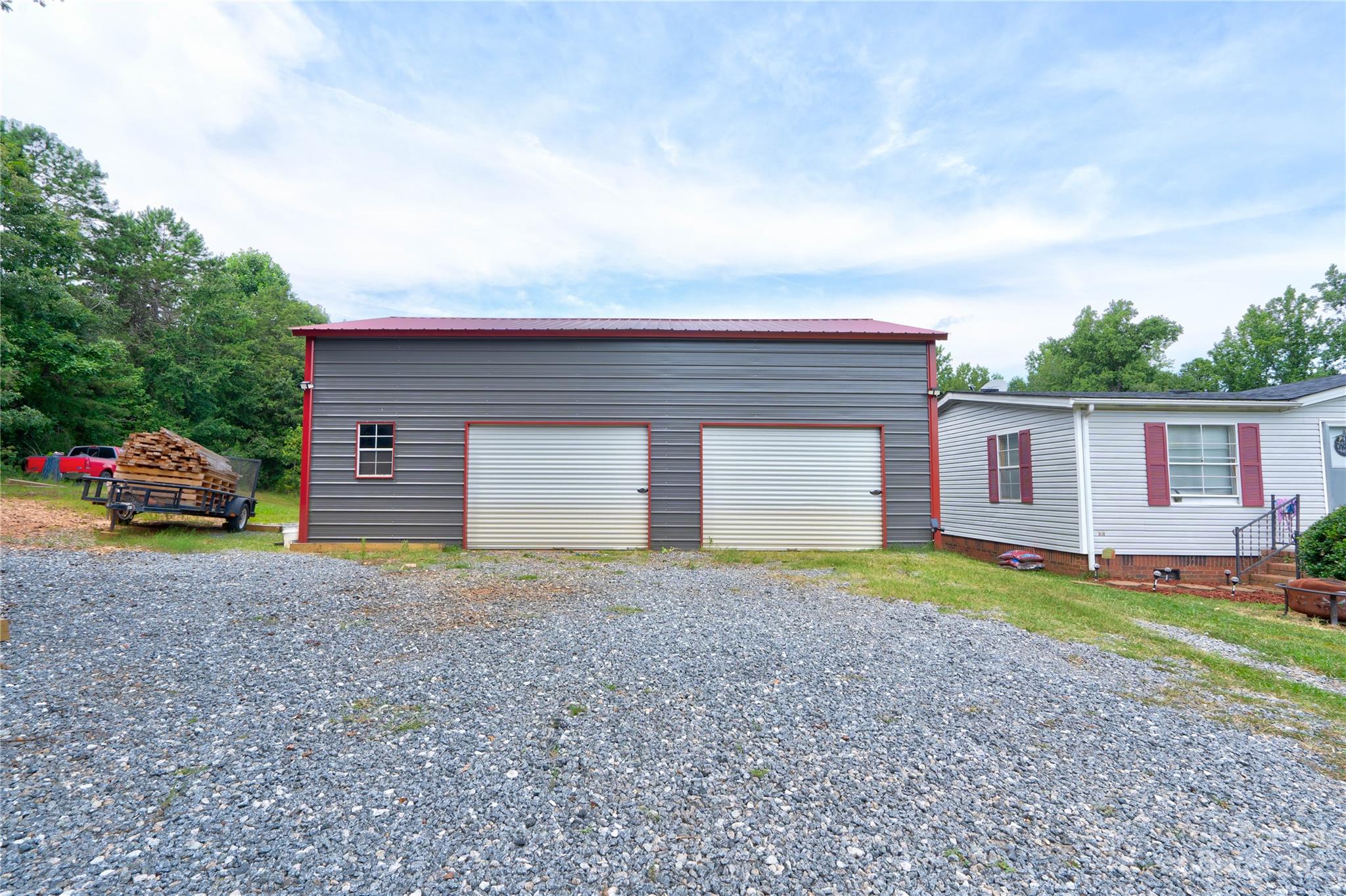 389 Shires Road Ellenboro, NC 28040 - Photo 3 of 30 a house view with a backyard space