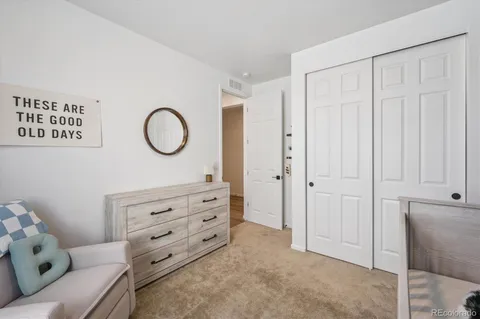 a room with furniture and a window