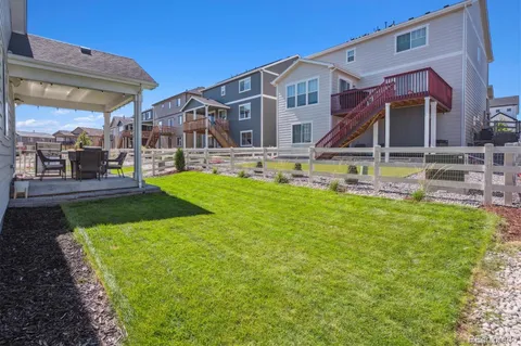 a front view of house with yard and seating space