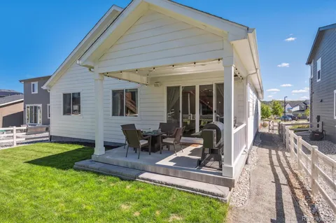 an aerial view of a house with a ocean view