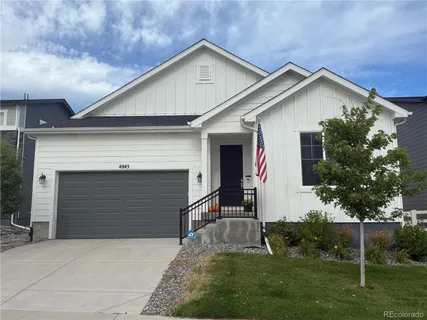 a front view of house with yard
