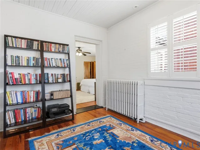 a view of a chairs and table in backyard