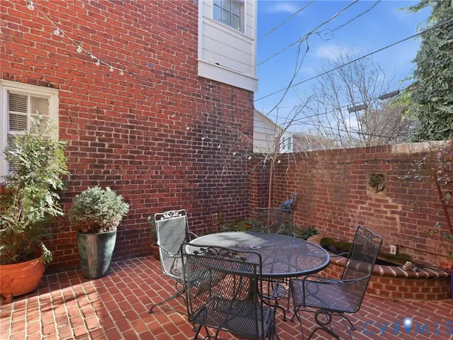 a view of a street with cars