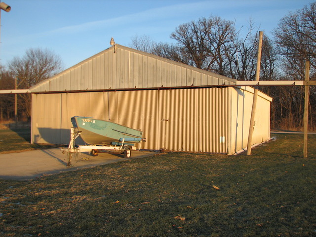 3065 South Gorman Road Gardner, IL 60424 - Photo 2 of 25 a backyard of a house with table and chairs