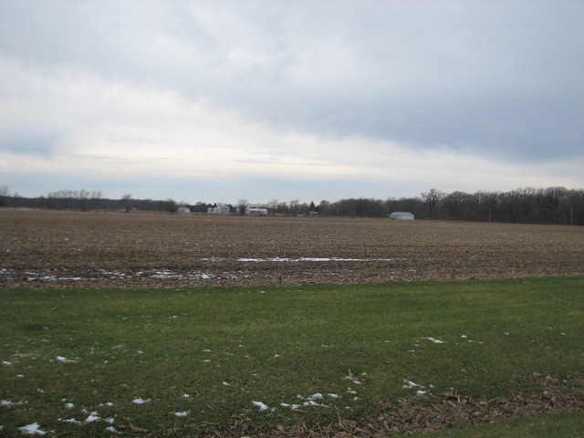 3065 South Gorman Road Gardner, IL 60424 - Photo 15 of 25 a view of a lake with houses in the back