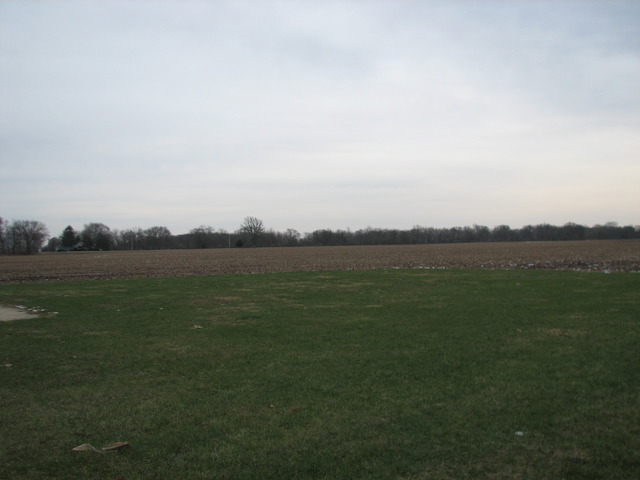 3065 South Gorman Road Gardner, IL 60424 - Photo 21 of 25 a view of a lake from a yard