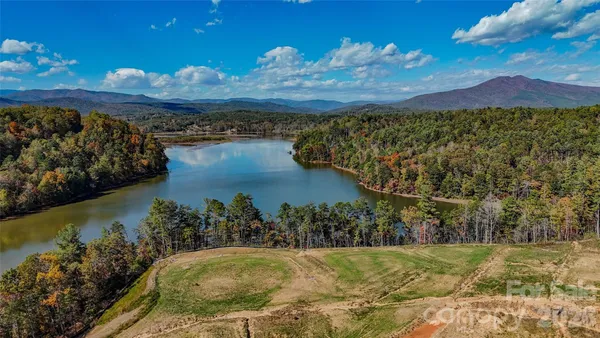 a view of a lake with a mountain in the background