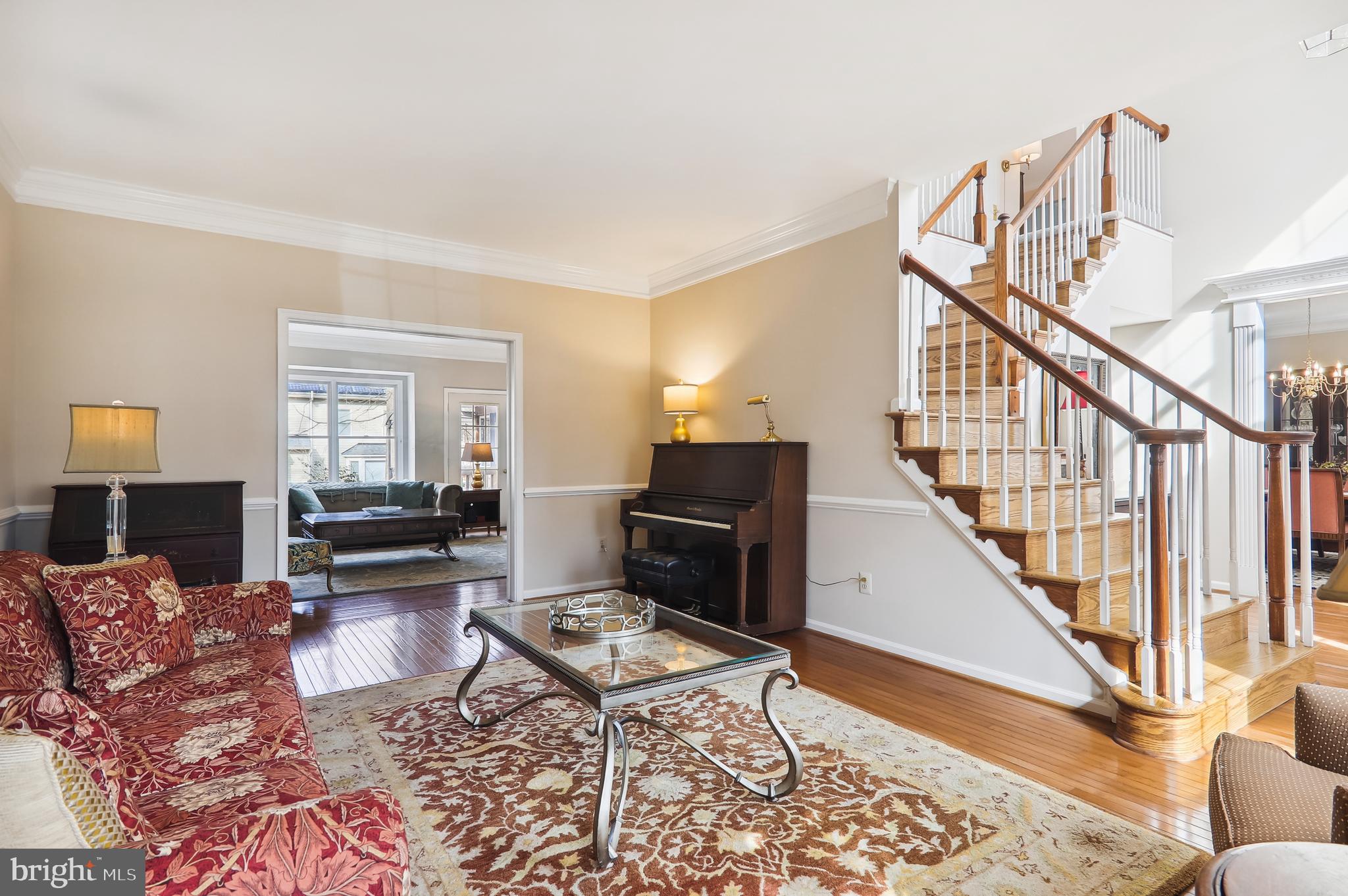 8001 Boulder Ridge Way Gaithersburg, MD 20882 - Photo 18 of 89 Formal living room is open to the foyer