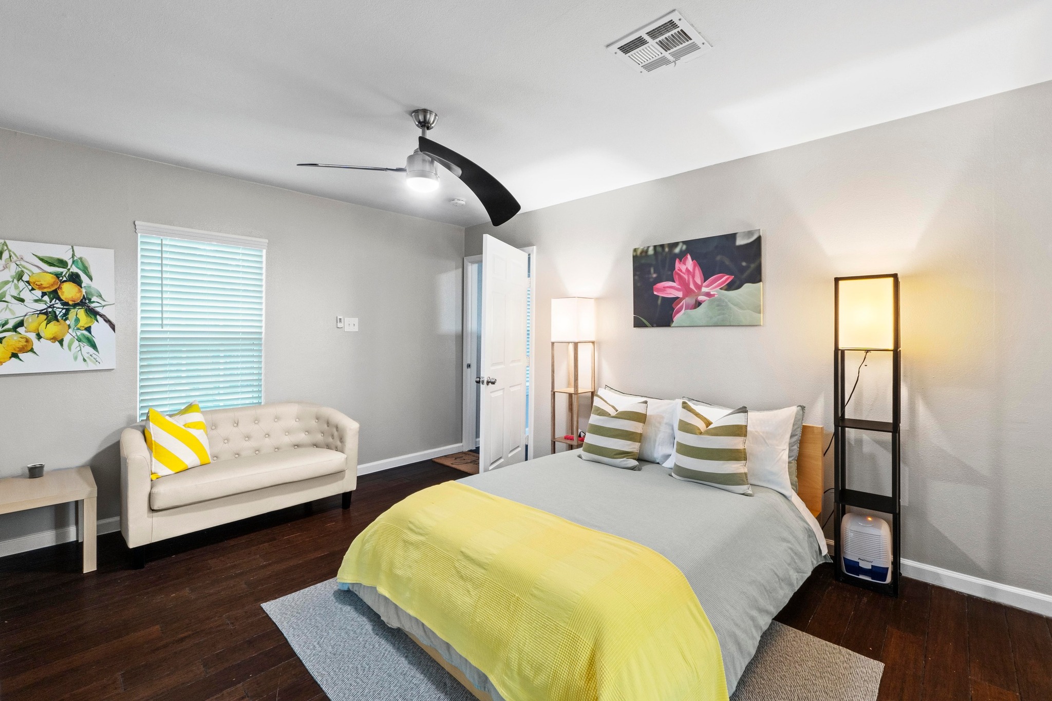 4512 Speedway, Unit A Austin, TX 78751 - Photo 24 of 39 a bedroom with a bed and a couch