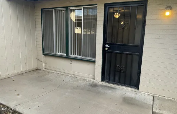 wooden floor and window in an empty room