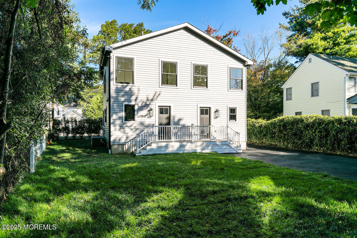 514-516 River Road Fair Haven, NJ 07704 - Photo 47 of 49 a view of a house with a yard and sitting area