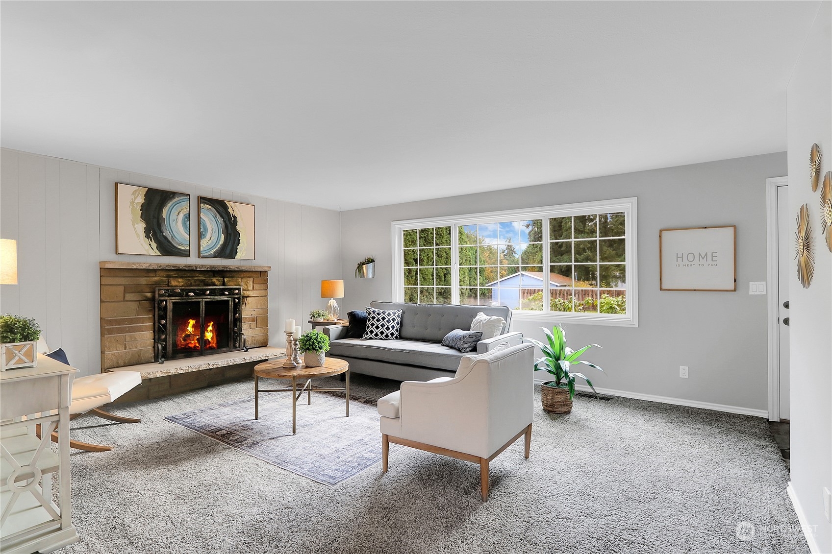 9510 Northeast 201st Street Bothell, WA 98011 - Photo 3 of 22 a living room with furniture and a fireplace